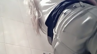 White chick in white pants pisses in the public restroom