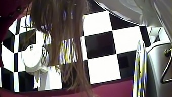 Long haired brunette girl in the toilet pissing on hidden cam