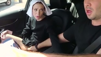 Slutty dark haired nun gives steamy deep throat to her friend in car