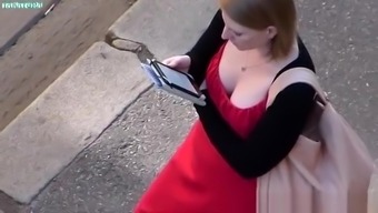 Looking to the neckline of the girl in a red dress