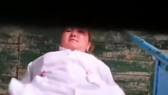 Kazakhstan women caught peeing into a dirty hole