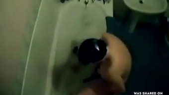 Masturbating in the bath, hidden camera
