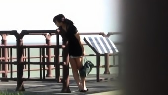 Asian babe public peeing