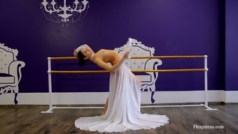 Attractive flexible ballerina Irina Brovkina exposes her inviting pussy