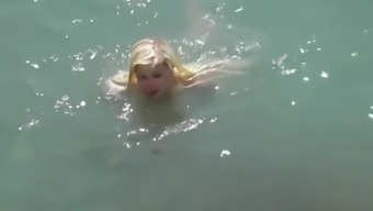 Slim blonde gets fucked with her boyfriend at a public beach