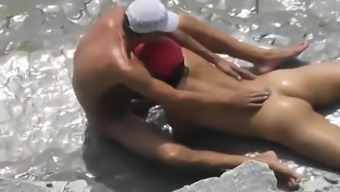 spying my sisters blowjob on the beach