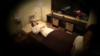 Alluring Japanese babe gets fucked hard on the massage bed