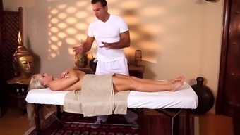 Massage loving beauty pussyfucked by masseur