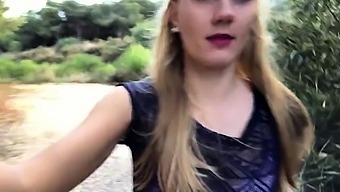 Hot blonde teen fucks herself with a dildo in the outdoors