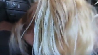 That blonde is sucking my dick in my car and she's so sensual and enthusiastic