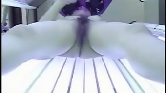 Teen with small tits masturbates in solorium