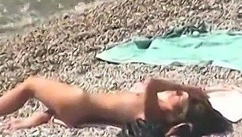 Morning beach nudity caught on by beach hidden cam