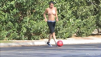 Outdoors video of a sexy babe flashing her perfect boobies