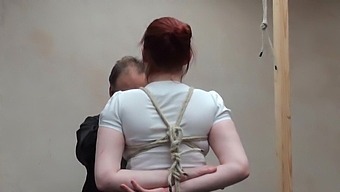 BDSM fetish video of redhead Sacha being tortured by her man