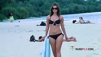 Public display of friends' naughty pussies on a nudist beach