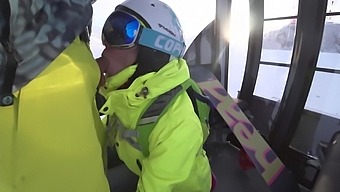 Tattooed babe gives a risky blowjob on a ski lift
