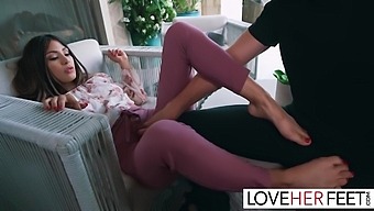 Brunette housemates indulge in a foot fetish