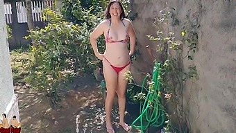 Amateur brunette gets peed on and showered for public display
