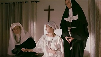 Lesbian nuns in stockings engage in sensual worship